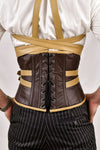 Men's leather corset with shoulder harness, offering a rugged and stylish design for added support and a bold look.